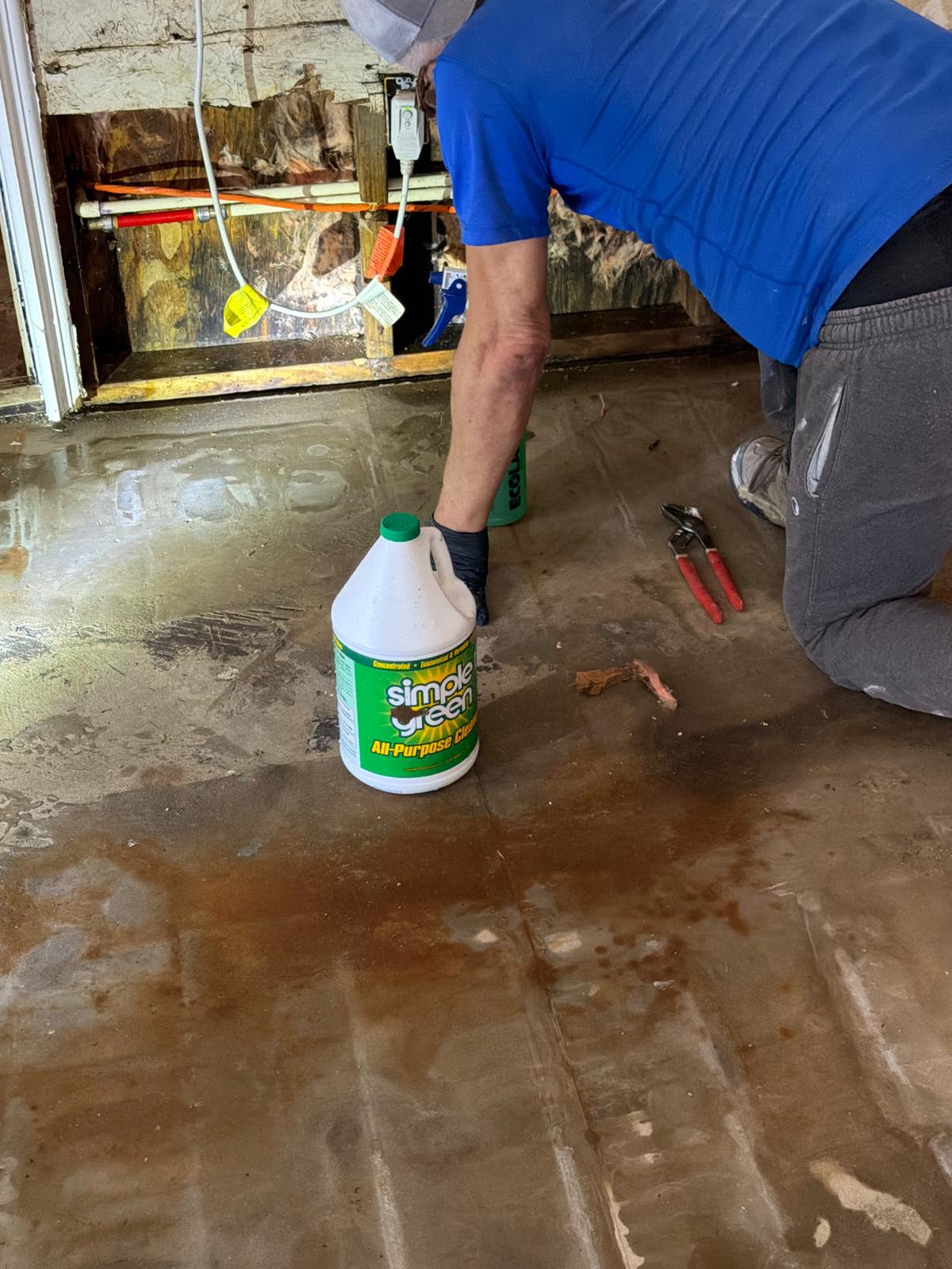 Cleaning and sanitizing a water-damaged floor